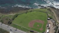 4K stock footage aerial video flyby coastal road revealing Mary Star Fromhold Baseball Field, San Pedro, California Aerial Stock Footage | DCA06_049