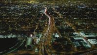 4K stock footage aerial video of following Interstate 10 through Downtown Los Angeles, California, night Aerial Stock Footage | DCA07_111