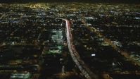 4K stock footage aerial video of approaching Interstate 10, Downtown, Los Angeles, California, night Aerial Stock Footage | DCA07_113
