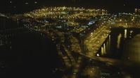 4K stock footage aerial video of panning across the Port of Long Beach, Long Beach, California, night Aerial Stock Footage | DCA07_123