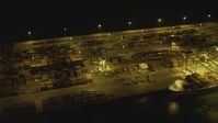 4K stock footage aerial video of cargo containers at Port of Long Beach, California, night Aerial Stock Footage | DCA07_143