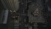 5K aerial stock footage video fly over skyscrapers and tilt to reveal 5th Street and the Los Angeles Public Library at sunset, California Aerial Stock Footage | DCLA_017
