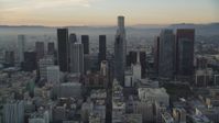 5K stock footage aerial video tilt from 5th Street to reveal and approach Downtown Los Angeles skyscrapers at sunset, California Aerial Stock Footage | DCLA_019