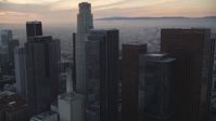 5K stock footage aerial video tilt to reveal and approach US Bank Tower at twilight in Downtown Los Angeles, California Aerial Stock Footage | DCLA_048
