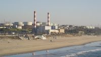 5K stock footage aerial video of beachside oil refinery with smoke stacks in El Segundo, California Aerial Stock Footage | DCLA_190