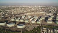 5K stock footage aerial video of giant tanks at an oil refinery in El Segundo, California Aerial Stock Footage | DCLA_193