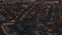5K stock footage aerial video tilt from Downtown Los Angeles to urban residential neighborhoods at sunset, California Aerial Stock Footage | DCLA_207