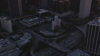 5K stock footage aerial video approach Downtown Los Angeles and tilt to reveal Highway 110 at sunset, California Aerial Stock Footage | DCLA_218