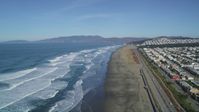 5K stock footage aerial video Waves rolling in toward Ocean Beach, Outer Sunset District, San Francisco, California Aerial Stock Footage | DCSF05_054