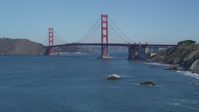 5K stock footage aerial video Tilt up from San Francisco Bay, reveal Golden Gate Bridge, San Francisco, California Aerial Stock Footage | DCSF05_061