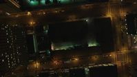 5K stock footage aerial video Bird's eye view of city streets and buildings in Downtown Oakland, California, night Aerial Stock Footage | DCSF06_096