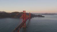 5K stock footage aerial video Passing the Golden Gate Bridge, Marin Headlands behind it, San Francisco, California, sunset Aerial Stock Footage | DCSF07_053