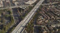 5K Aerial Video Reverse view of I-280 and apartment buildings, San Jose, California Aerial Stock Footage | DCSF09_013