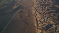 5K Aerial Video Reverse view of a desert road beside San Andreas Fault, San Luis Obispo County, California Aerial Stock Footage | DCSF12_012