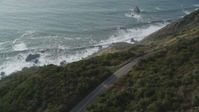 5K stock footage aerial video of flying by Highway 1 coastal road above cliffs, Big Sur, California Aerial Stock Footage | DFKSF03_086