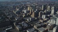 5K stock footage aerial video of flying by city buildings around Tribune Tower in Downtown Oakland, California Aerial Stock Footage | DFKSF05_004