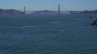 5K stock footage aerial video of tilting from the ocean to reveal the famous Golden Gate Bridge, San Francisco, California Aerial Stock Footage | DFKSF05_062
