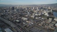 5K stock footage aerial video tilt from I-880 freeway to reveal Downtown Oakland, California Aerial Stock Footage | DFKSF06_009