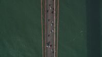 5K stock footage aerial video of a bird's eye view of traffic driving on the Golden Gate Bridge, San Francisco, California Aerial Stock Footage | DFKSF06_090