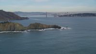5K stock footage aerial video of a view of the Marin Headlands coastal cliffs and iconic Golden Gate Bridge, Marin County, California Aerial Stock Footage | DFKSF06_157