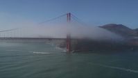 5K stock footage aerial video of approaching the Golden Gate Bridge wrapped in fog, San Francisco, California Aerial Stock Footage | DFKSF09_023