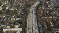 5K stock footage aerial video of a reverse view of I-280 freeway with light traffic, San Jose, California Aerial Stock Footage | DFKSF12_011