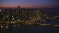 5K stock footage aerial video of Downtown San Francisco skyscrapers and the Bay Bridge, California, twilight Aerial Stock Footage | DFKSF14_072