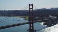 5K stock footage aerial video of flying by a tower on the Golden Gate Bridge, San Francisco, California Aerial Stock Footage | DFKSF15_030