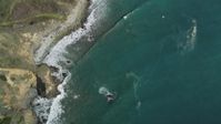 5K stock footage aerial video of a bird's eye view of coastal cliffs, revealing rocky beach, Big Sur, California Aerial Stock Footage | DFKSF16_112
