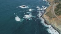 5K stock footage aerial video of flying away from Highway 1 and coastal cliffs, Big Sur, California Aerial Stock Footage | DFKSF16_128
