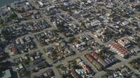 5K stock footage aerial video of a reverse view of suburban neighborhoods in Morro Bay, California Aerial Stock Footage | DFKSF16_157