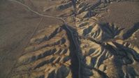 5K stock footage aerial video tilt up along San Andreas Fault in the desert, San Luis Obispo County, California Aerial Stock Footage | DFKSF17_031