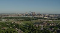 5.7K stock footage aerial video wide angle of skyline and Arch from interstate and park, sunrise, Downtown St. Louis, Missouri Aerial Stock Footage | DX0001_000550