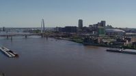 5.7K stock footage aerial video of flying over the river toward Downtown St. Louis, Missouri Aerial Stock Footage | DX0001_000650