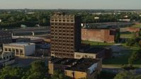 5.7K stock footage aerial video of an abandoned brick building at sunset in East St. Louis, Illinois Aerial Stock Footage | DX0001_000669