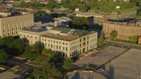 5.7K stock footage aerial video of approaching a federal courthouse at sunset in East St. Louis, Illinois Aerial Stock Footage | DX0001_000685