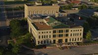 5.7K stock footage aerial video circle and fly away from a federal courthouse at sunset, East St. Louis, Illinois Aerial Stock Footage | DX0001_000692