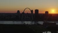 5.7K stock footage aerial video of the setting sun, the Gateway Arch and Downtown St. Louis, Missouri skyline Aerial Stock Footage | DX0001_000724