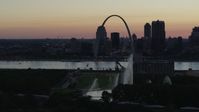 5.7K stock footage aerial video reverse view of Gateway Geyser and Arch, Downtown St. Louis, Missouri, twilight Aerial Stock Footage | DX0001_000751