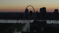 5.7K stock footage aerial video approach Gateway Geyser and the Arch across the river, Downtown St. Louis, Missouri, twilight Aerial Stock Footage | DX0001_000761