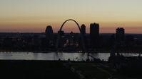 5.7K stock footage aerial video of Downtown St. Louis, Missouri, at twilight seen while descending Aerial Stock Footage | DX0001_000770