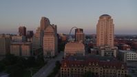 5.7K stock footage aerial video of passing courthouses with view of the Arch, reveal city hall at sunset, Downtown St. Louis, Missouri Aerial Stock Footage | DX0001_000869