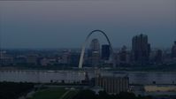 5.7K stock footage aerial video of the Gateway Arch and the skyline of Downtown St. Louis, Missouri, at twilight Aerial Stock Footage | DX0001_000911