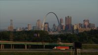 5.7K stock footage aerial video of the Gateway Arch in the morning while descending, reveal I-55, Downtown St. Louis, Missouri Aerial Stock Footage | DX0001_000955