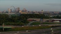 5.7K stock footage aerial video pan across I-55 to reveal the Gateway Arch in the morning, Downtown St. Louis, Missouri Aerial Stock Footage | DX0001_000957