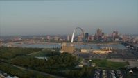 5.7K stock footage aerial video flyby grain elevator with view of the Gateway Arch in the morning, and descend, Downtown St. Louis, Missouri Aerial Stock Footage | DX0001_000963