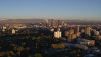 5.7K stock footage aerial video of downtown skyscrapers seen from apartment buildings at sunrise, Downtown Denver, Colorado Aerial Stock Footage | DX0001_001402
