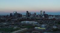 5.7K stock footage aerial video of a slow approach to the city's downtown skyline at sunset, Downtown Denver, Colorado Aerial Stock Footage | DX0001_001577