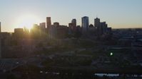 5.7K stock footage aerial video flyby skyscraper for view of city skyline at sunrise in Downtown Denver, Colorado Aerial Stock Footage | DX0001_001617