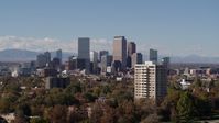 5.7K stock footage aerial video pass the city's skyline before ascending, Downtown Denver, Colorado Aerial Stock Footage | DX0001_001737
